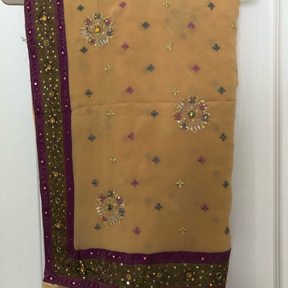 Preloved Saree fabric in tan with machine and hand embroidery, and purple lace.